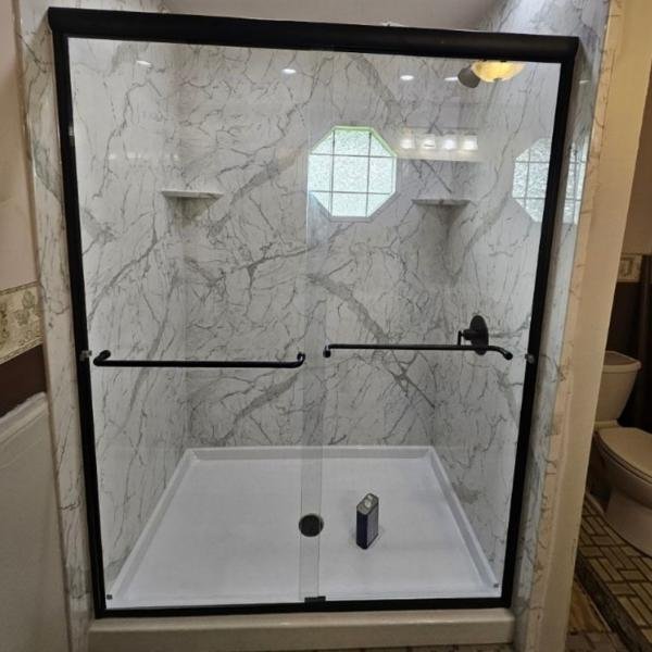 Acrylic walk-in shower installation services with built-in seat and grab bars in Pittsburgh, PA