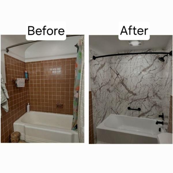 Modern white acrylic bathtub with textured wall surround installed by CNS Cousins Construction