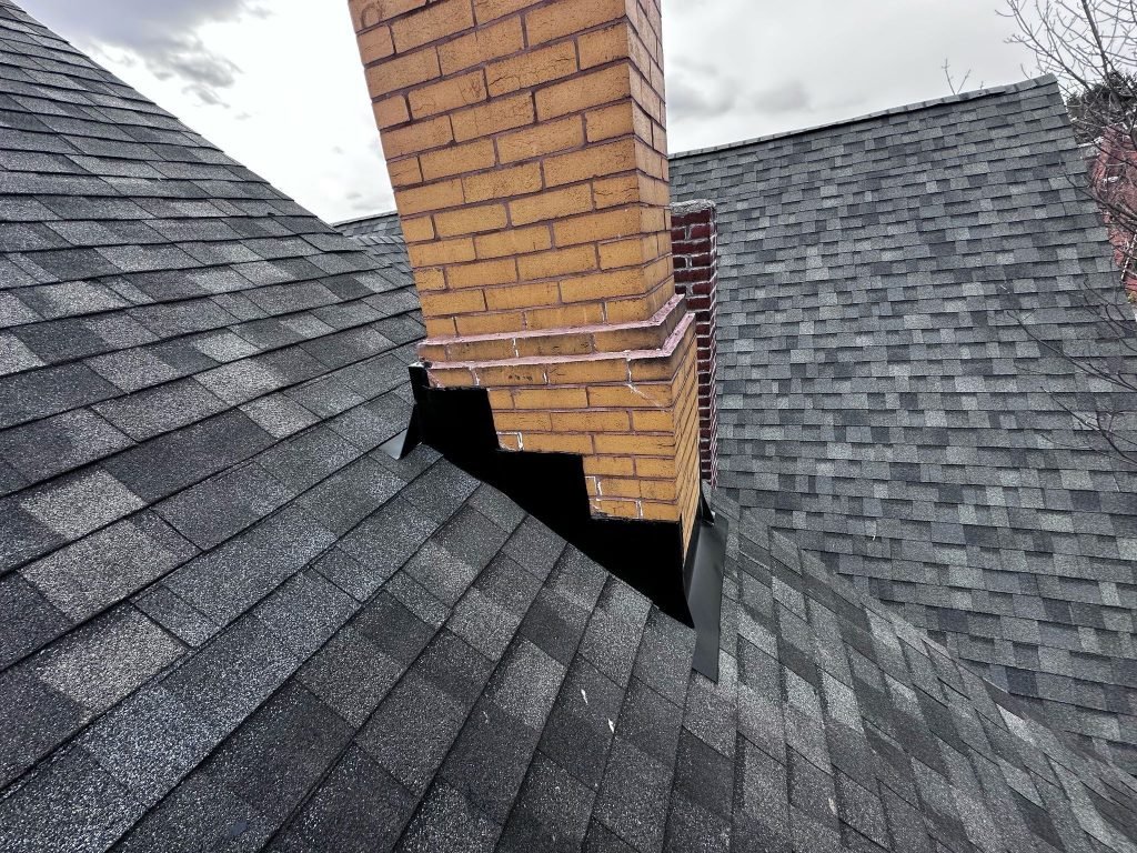 Reliable roofing contractor in Plum, PA replacing asphalt shingles