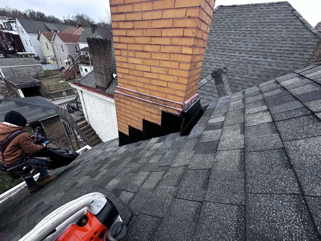 Local roofing contractor near me in Cranberry, PA completing roof replacement