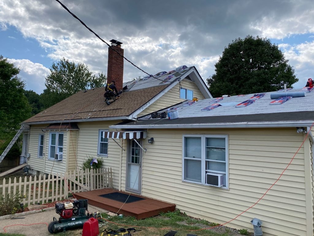 Local roofing contractor near me in Monaca, PA repairing residential leak