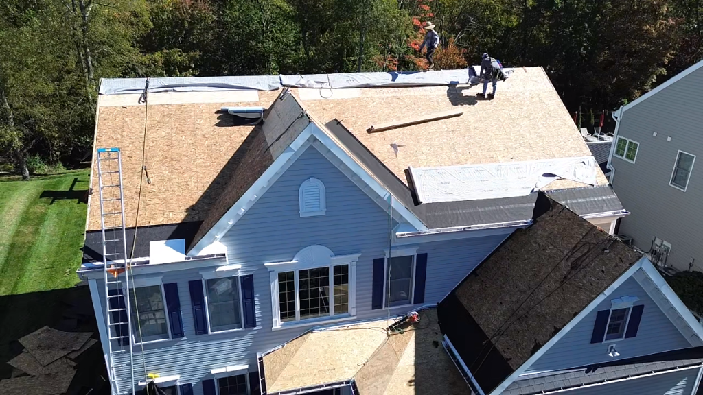 Trusted roofing contractor in Beaver, PA working on historic home